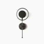 Modern black ring LED wall lamp with dual concentric circles, front view on studio background showcasing minimalist design