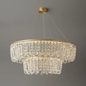 Modern two-tier brass chandelier overhead perspective showing layered crystal trim and brass ring frame