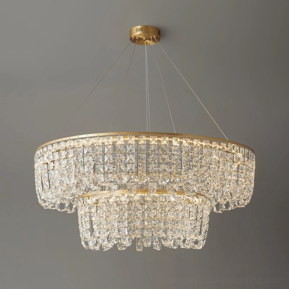 Modern two-tier brass chandelier overhead perspective showing layered crystal trim and brass ring frame