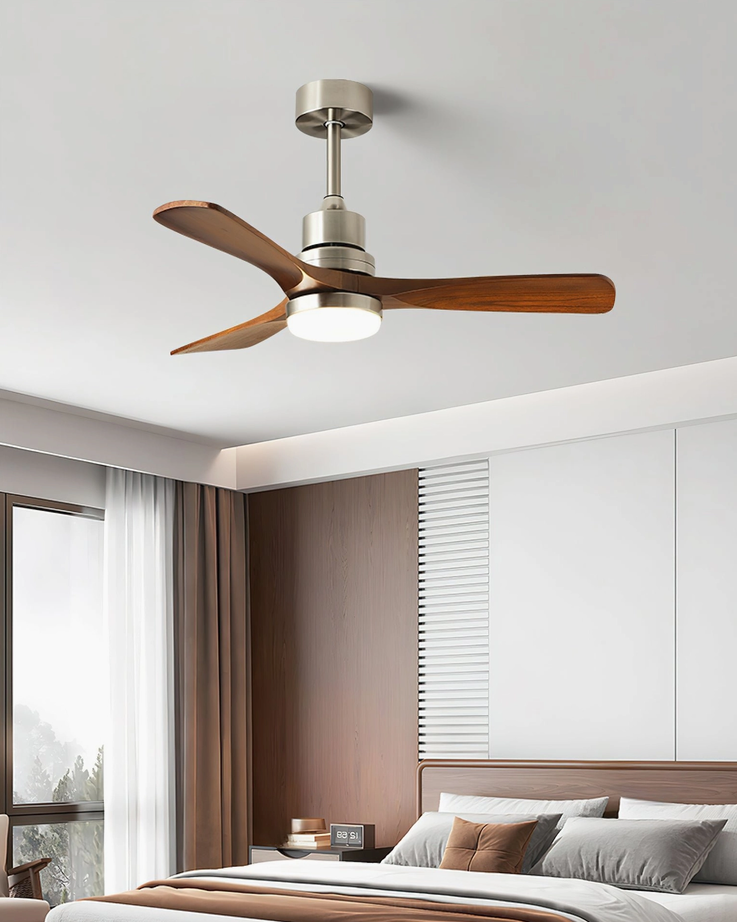 Modern integrated LED ceiling fan light fixture in minimalist bedroom, neutral contemporary decor with large natural window