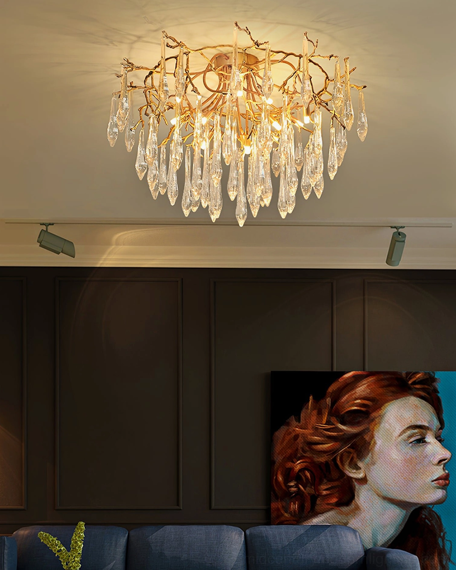 Modern teardrop crystal ceiling light installed in luxury living room with dark wall panels