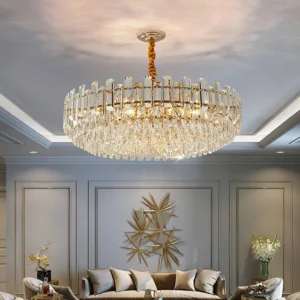 Contemporary crystal chandelier installed in luxury living room with gold hardware and cascading crystal droplets