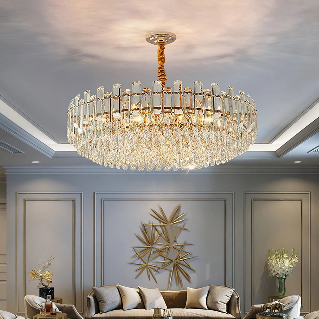 Contemporary crystal chandelier installed in luxury living room with gold hardware and cascading crystal droplets
