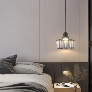 Contemporary minimalist crystal pendant lamp with geometric metal frame and diamond-cut crystal accents