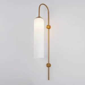 Minimalist modern glass wall sconce with elongated vertical metal rod and dual gold round mounting accents