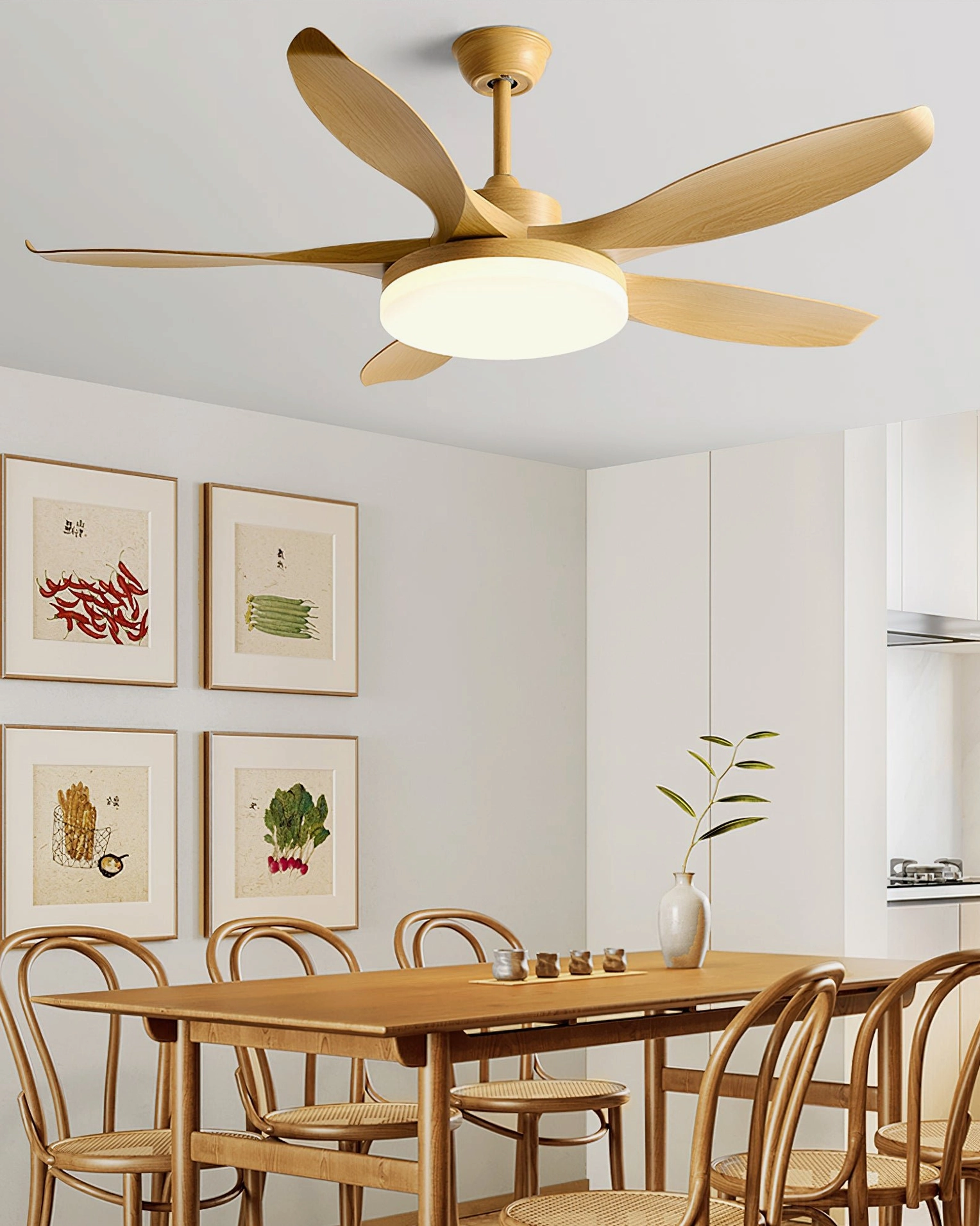 Light wood grain ceiling fan light in modern minimalist dining kitchen with gallery wall of art prints