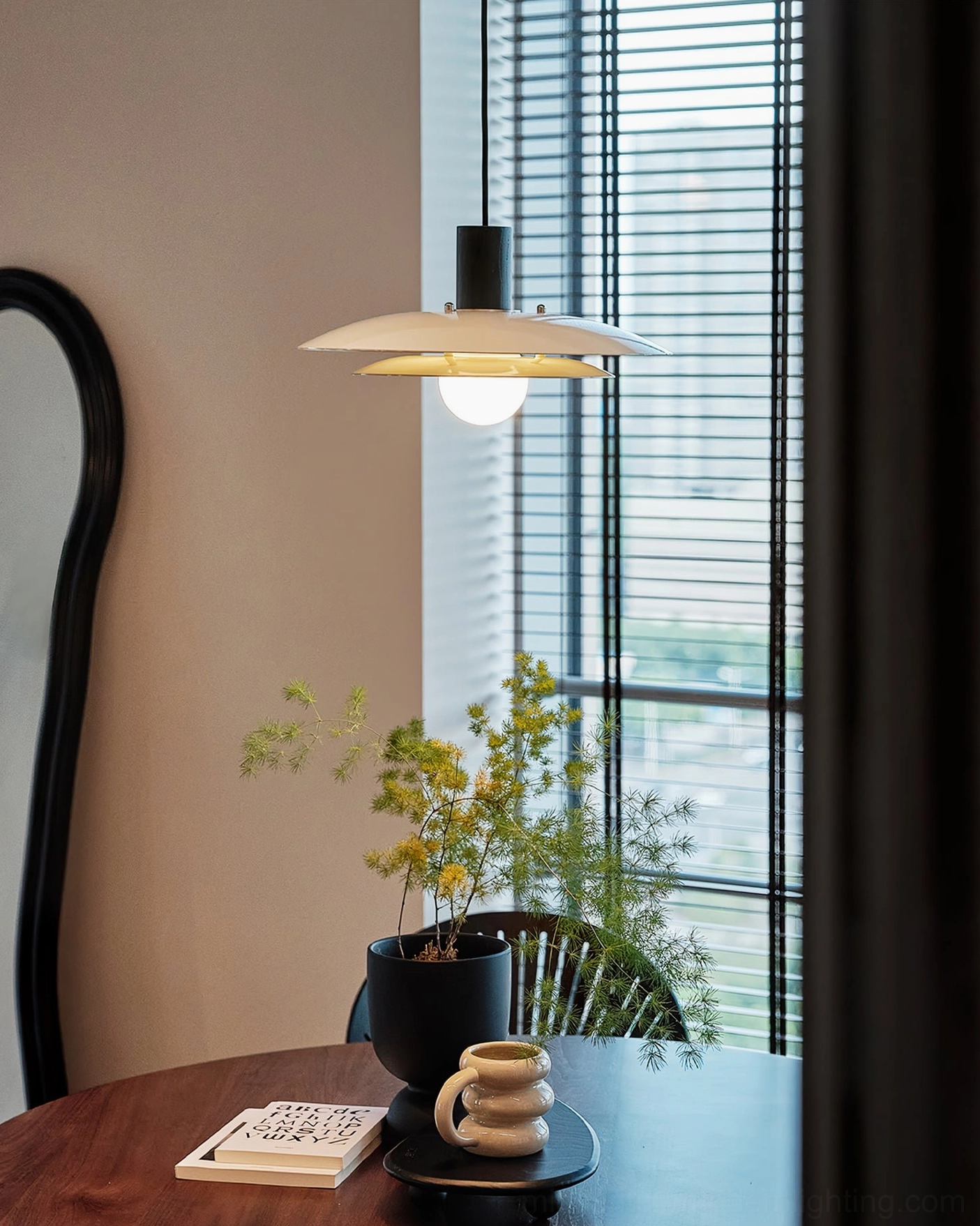 Modern dining pendant lamp demonstrating clean geometric lines and understated elegance in contemporary home