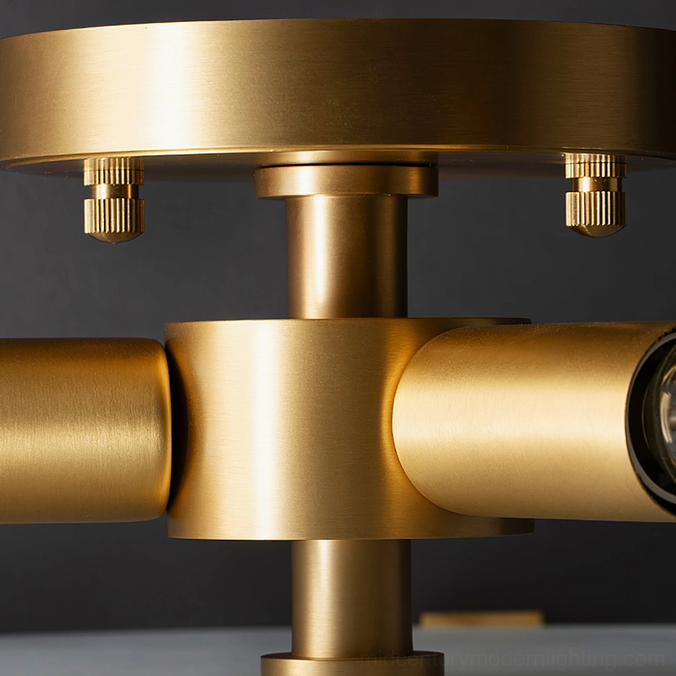 Modern geometric brass ceiling lamp creating architectural interest in home interior