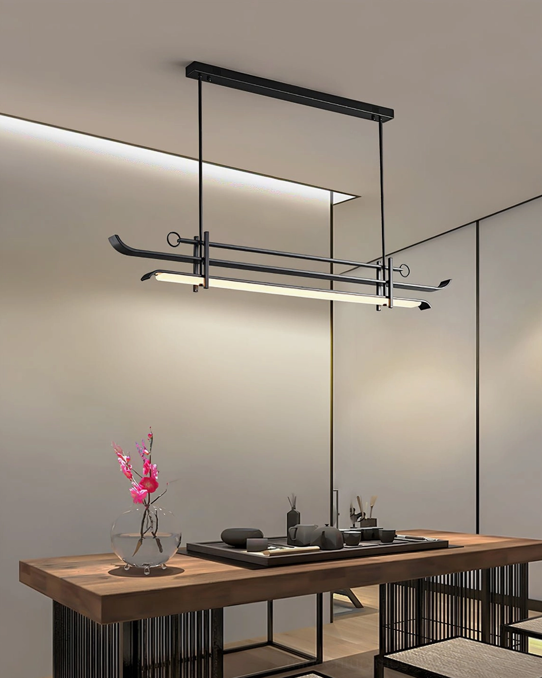 Modern linear LED chandelier displayed in luxury tea room setting with traditional elements and ambient lighting