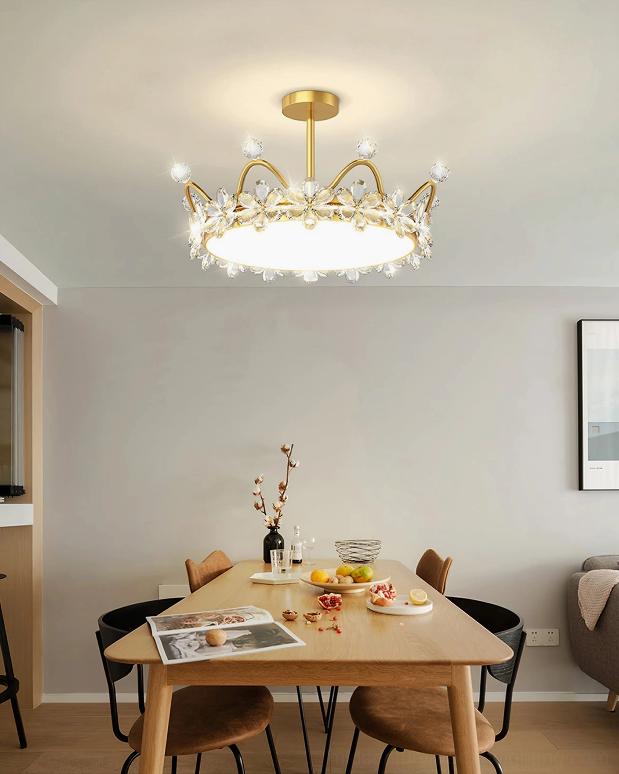 Modern ceiling light with gold metal and crystal flower petals, product display showing delicate sculptural design elements