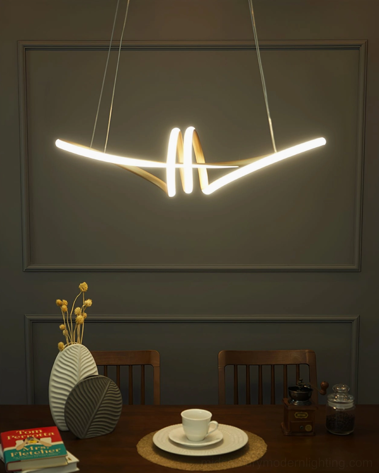 Modern gold twisted LED pendant chandelier architectural detail, contemporary lighting fixture showing sculptural geometric form
