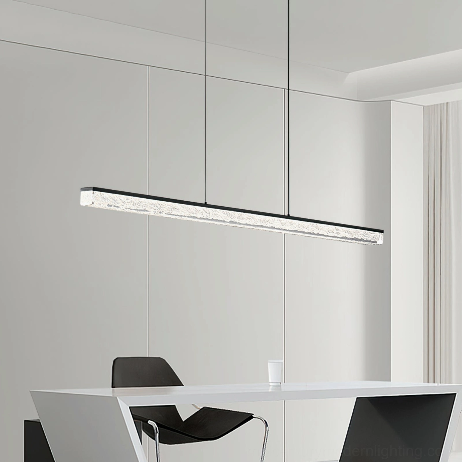 Contemporary linear LED pendant light fixture in modern home office workspace, three-quarter angle