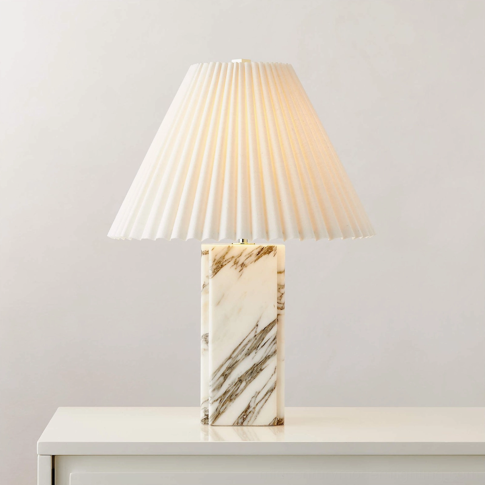 Bianca marble table lamp as focal point in modern mid-century home office workspace