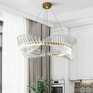Contemporary gold Möbius crystal chandelier installed in luxury modern kitchen, warm LED illumination from below