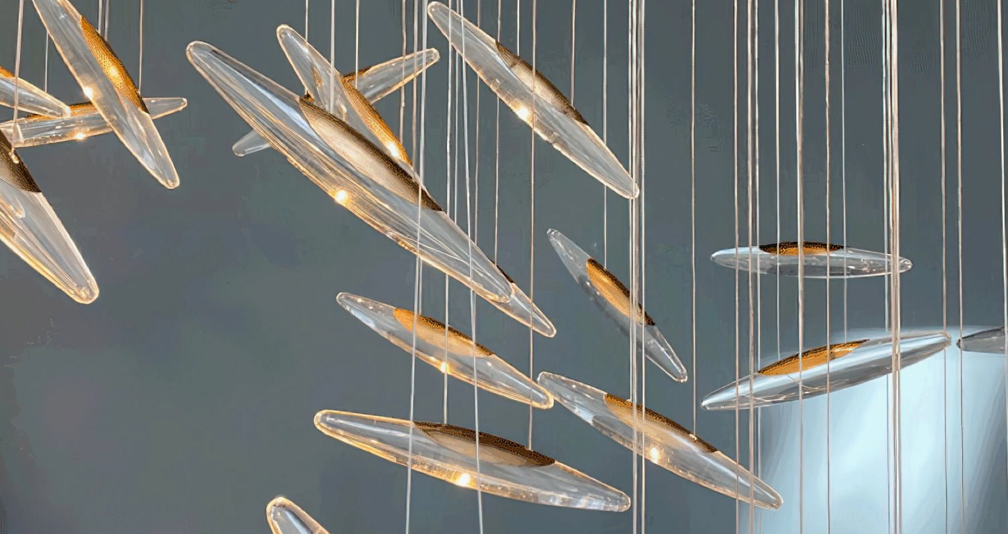 Modern moonlight whispers chandelier in spacious dining hall demonstrating grand scale installation