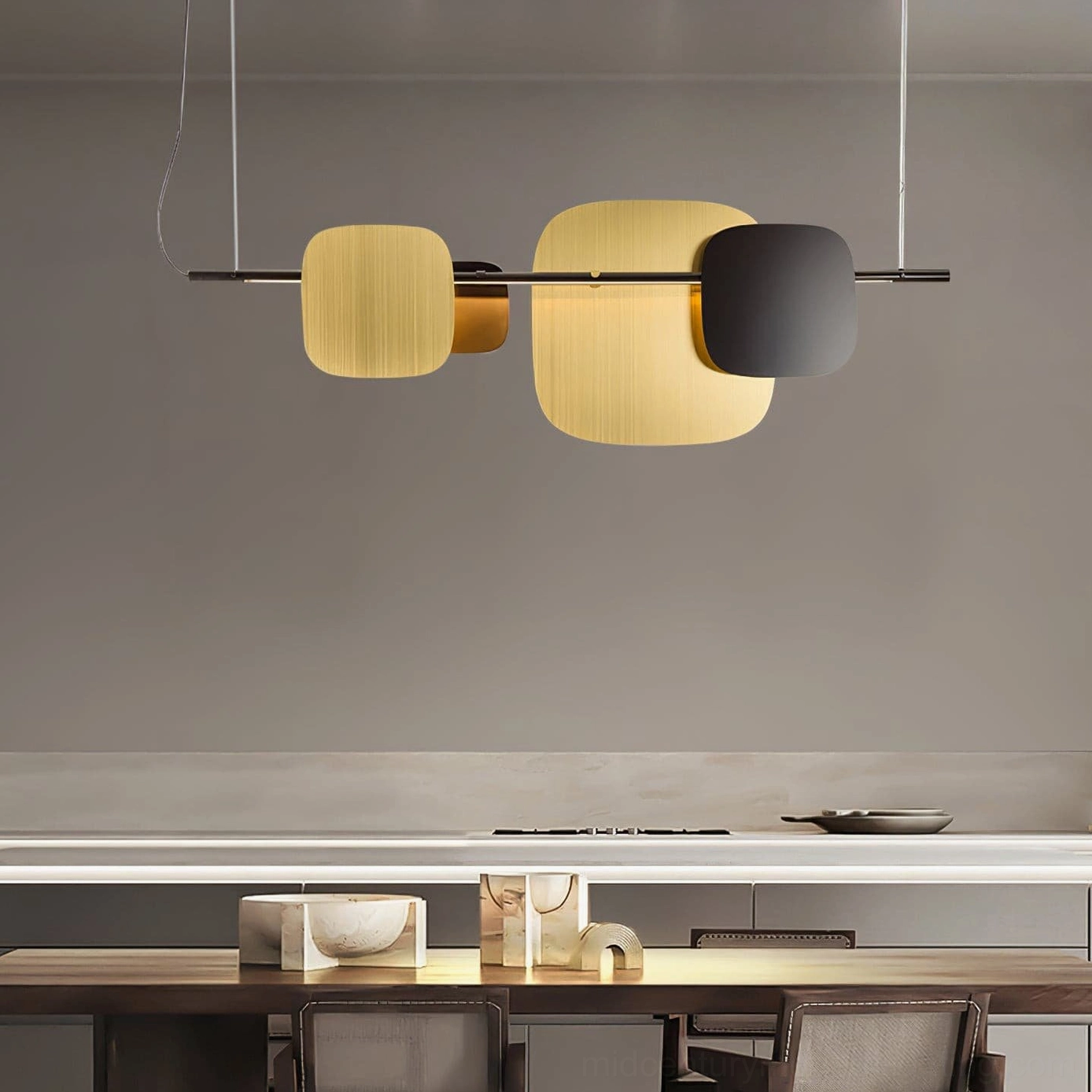 Contemporary rounded square pendant light hanging above modern dining table in luxury minimalist kitchen setting