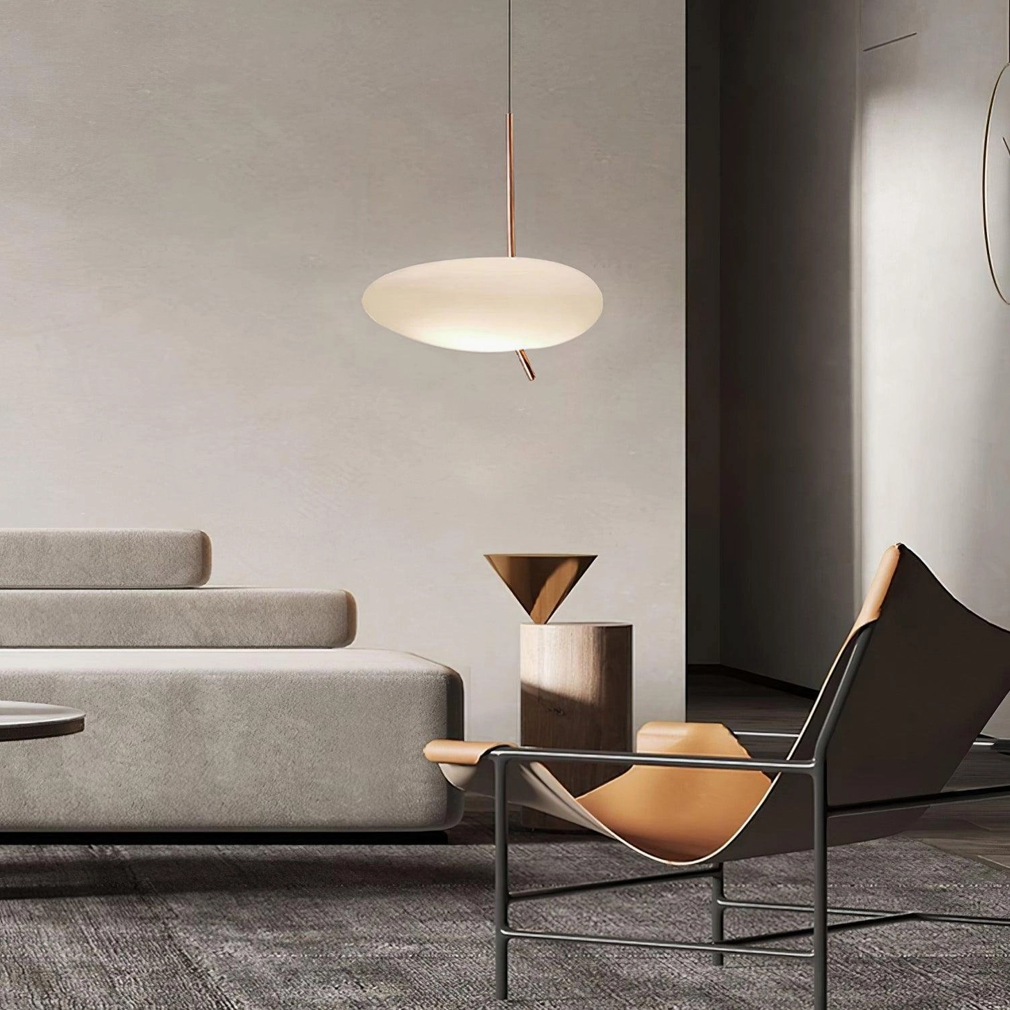 Modern pebbles pendant light installed in contemporary living room lounge area with off-white shade and warm copper fixtures