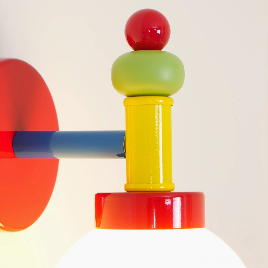 Modern glass wall sconce installed in contemporary interior with minimalist aesthetic