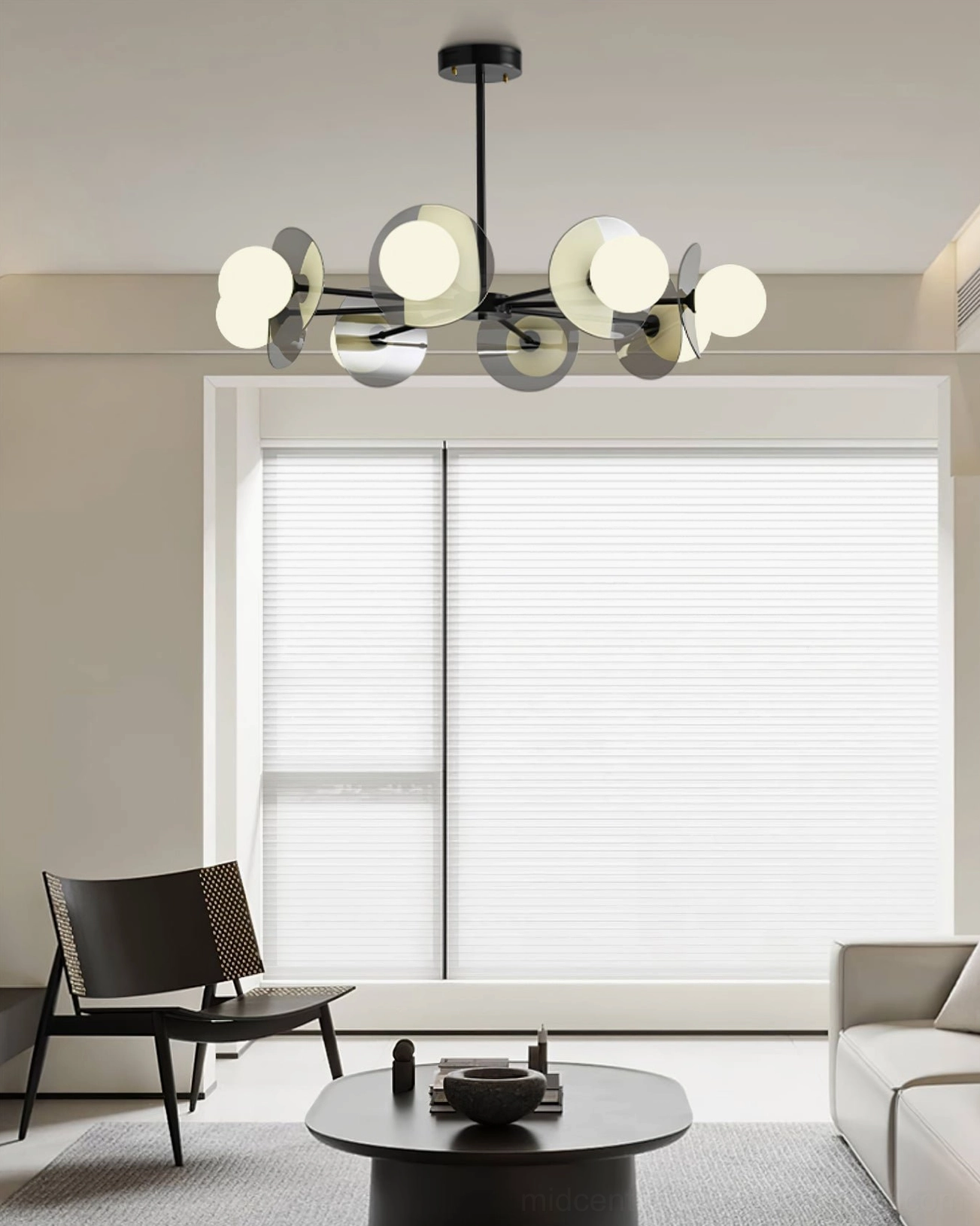 Modern sputnik chandelier low under-eye view in minimalist lounge area with single chair and sofa warm glowing lamps