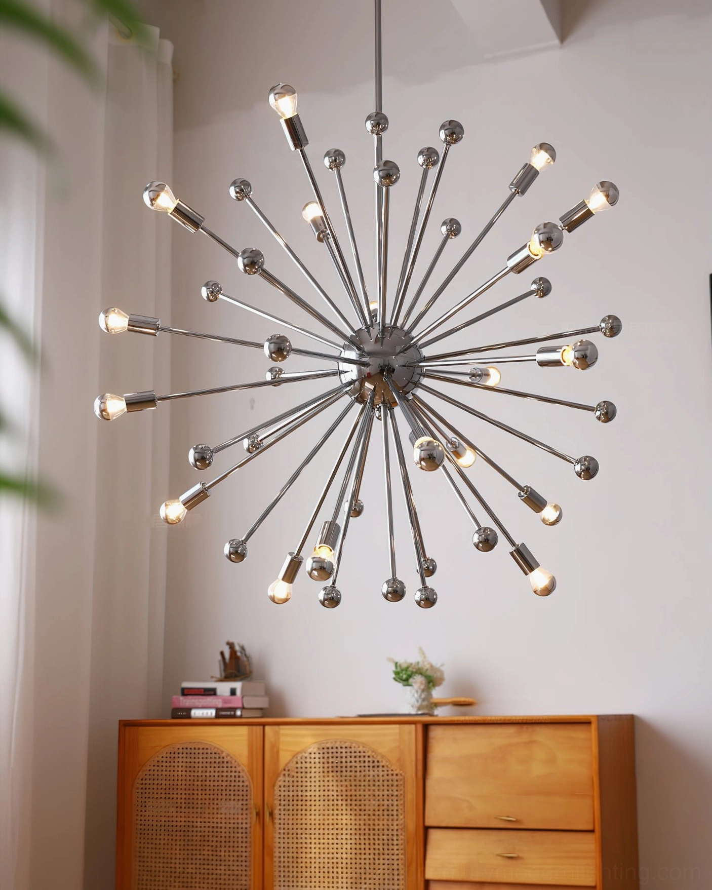 Space-age sputnik ceiling light unlit chrome metallic finish with minimalist modern decor