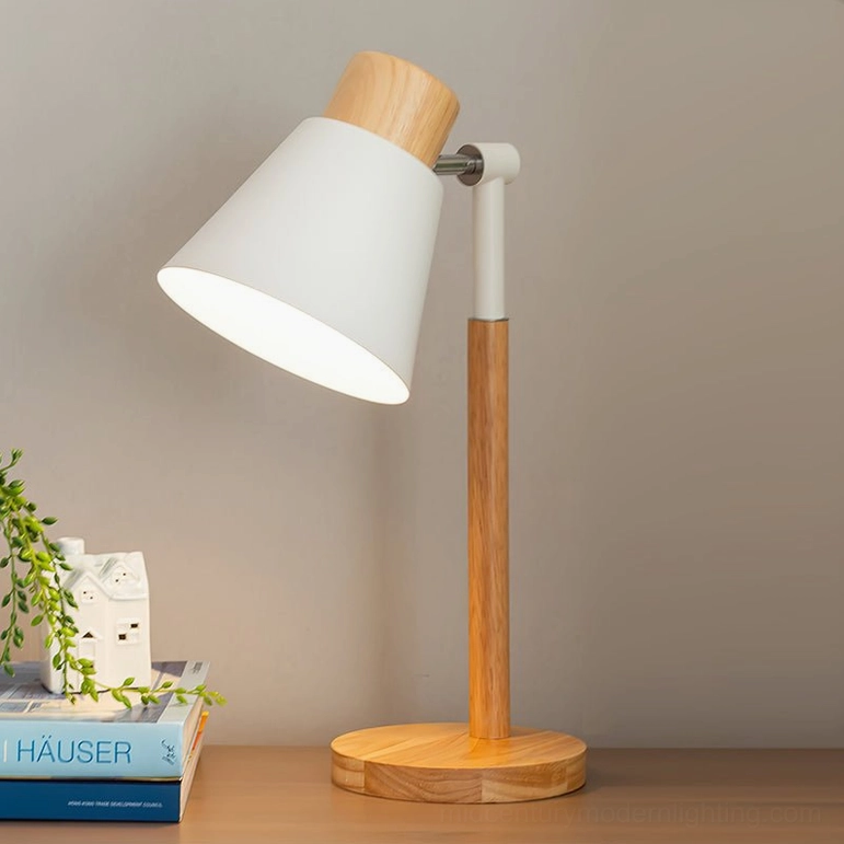 Minimalist wooden base table lamp with tapered white shade and bird ornament detail, side angle view