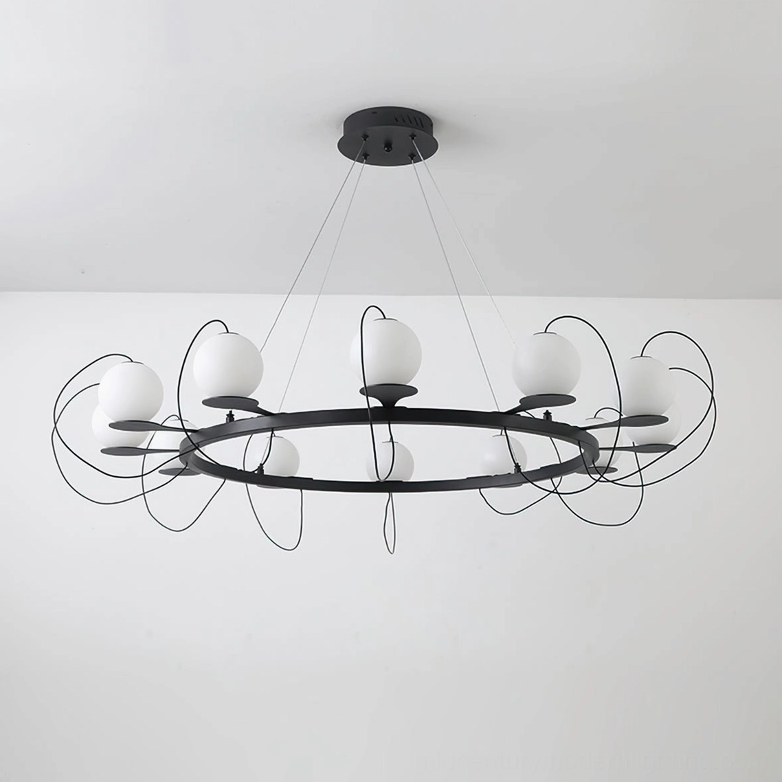Modular magnetic bubble pendant light showing various frosted glass orb configurations