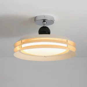 Close-up overhead view of Moers lamp revealing white wood-style dual-layer band construction and integrated LED diffuser
