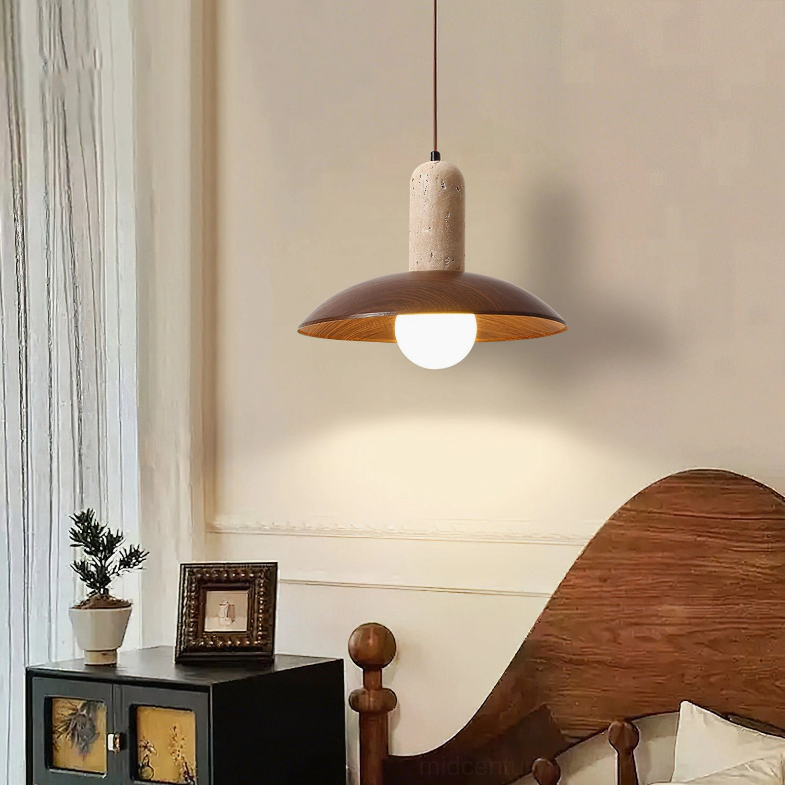 Single molly pendant light installed in warm rustic bedroom interior with natural lighting