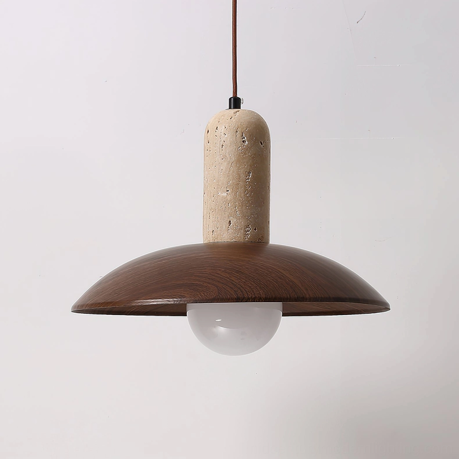 Molly travertine walnut pendant light detail with natural stone surface and wood dome shade