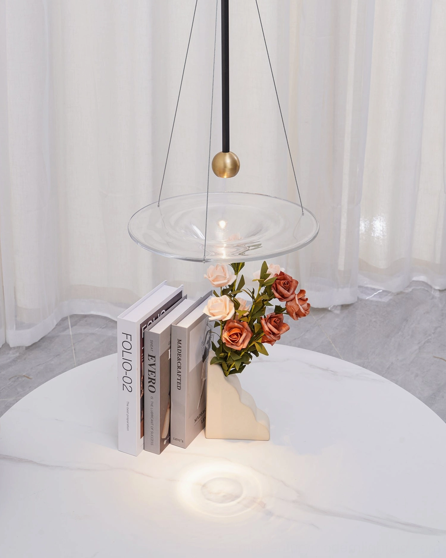 Momento glass pendant light - sculptural pendant design with transparent glass diffuser and metal hardware