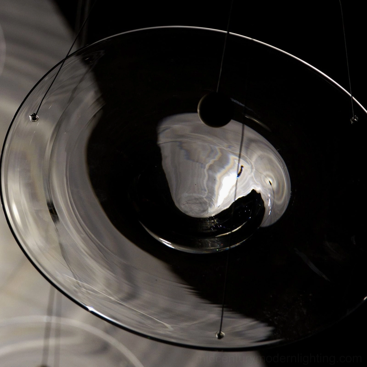 Momento pendant lamp detail showing integrated LED chip and glass sphere construction method