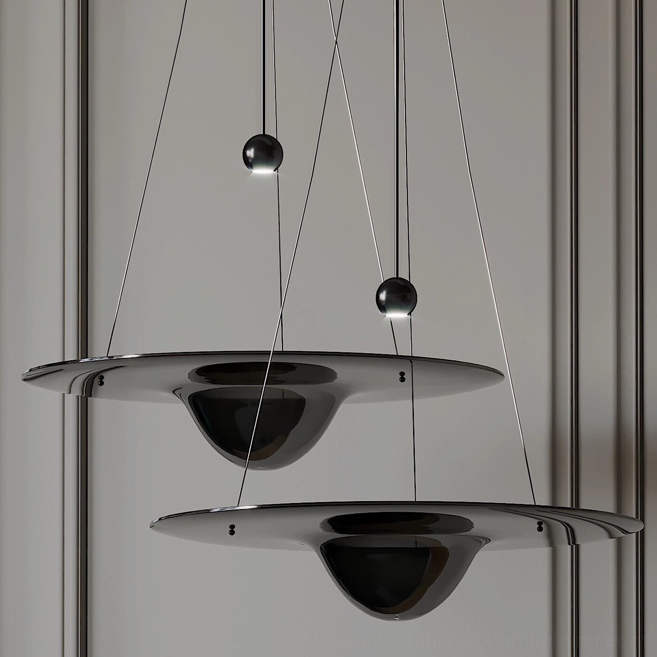 Multiple Momento pendant lights in minimalist modern interior with thin suspension wires and soft ambient glow