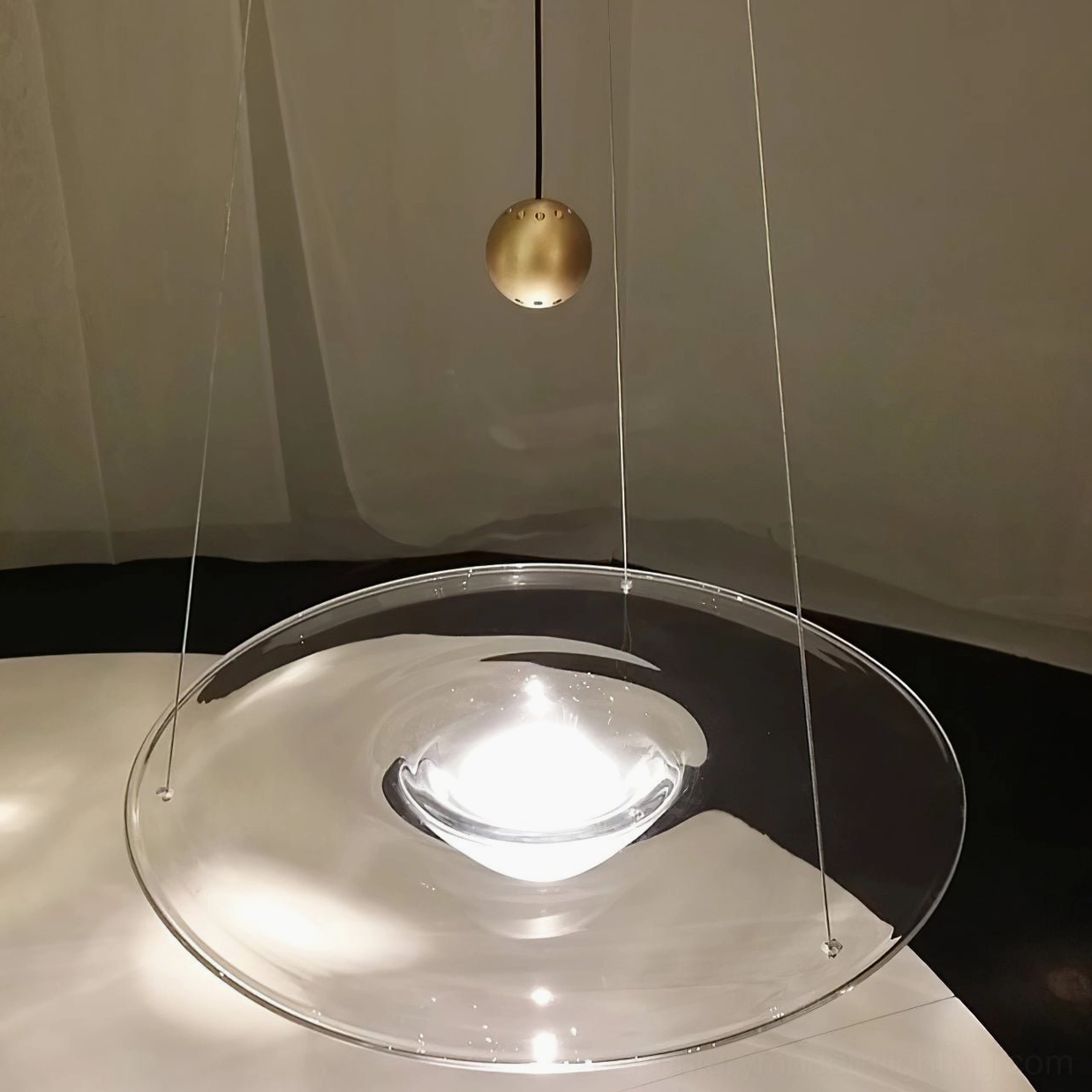 Momento glass pendant suspension wire and metal connection hardware detail view