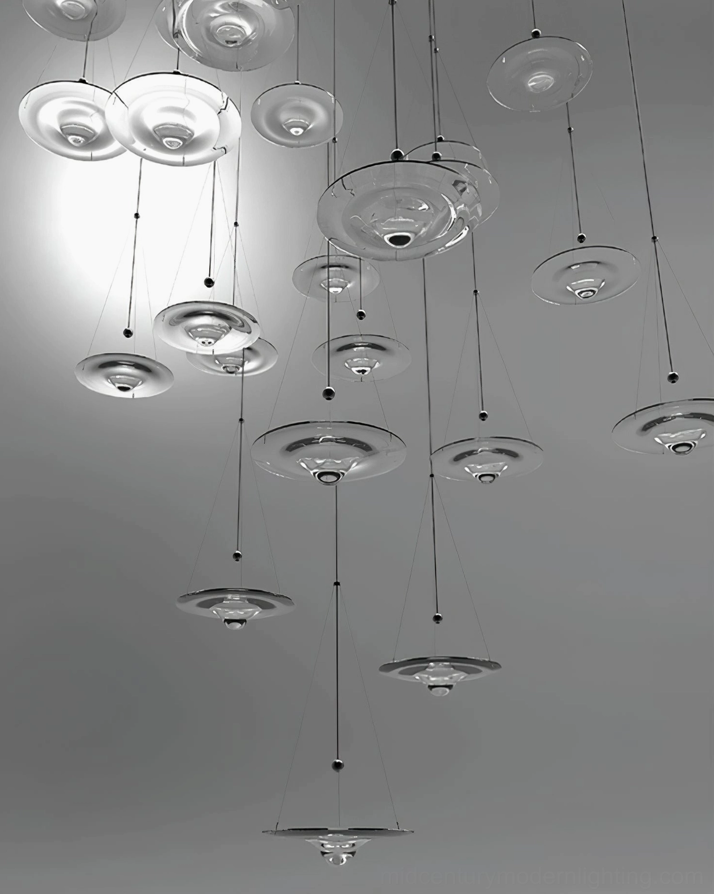 Momento pendant lamps arranged in artistic composition showing sculptural form and light behavior