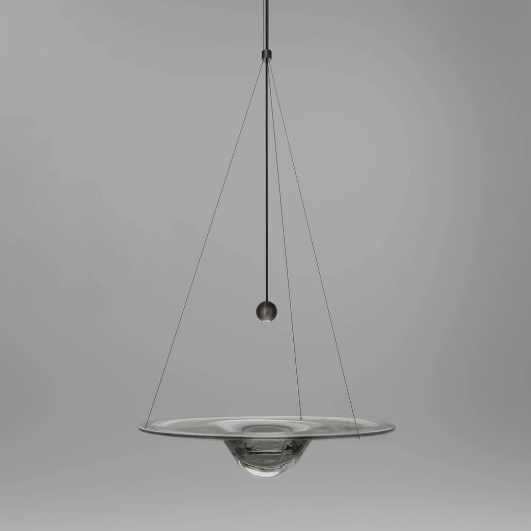 Momento sculptural glass pendant lamp showcasing artistic design and light diffusion qualities