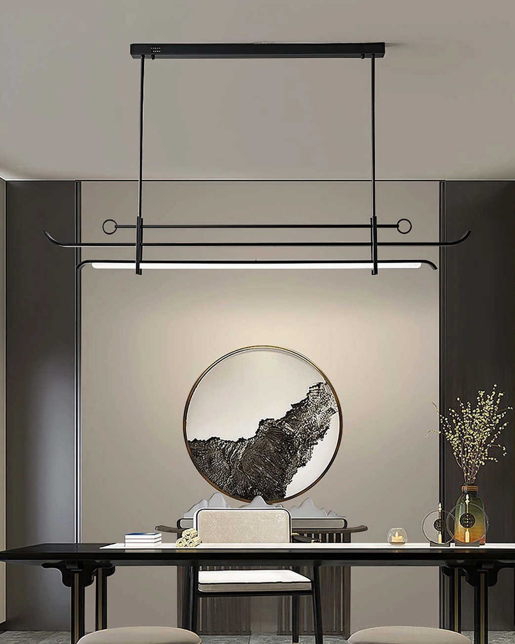 Minimalist dining room interior featuring geometric LED pendant light above wooden dining table with monochrome landscape art