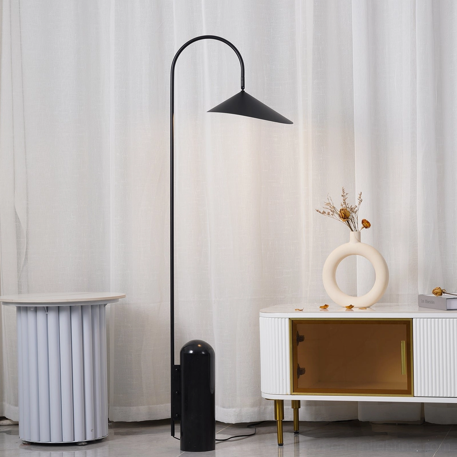 Mono floor lamp beige variant in interior with warm neutral color palette