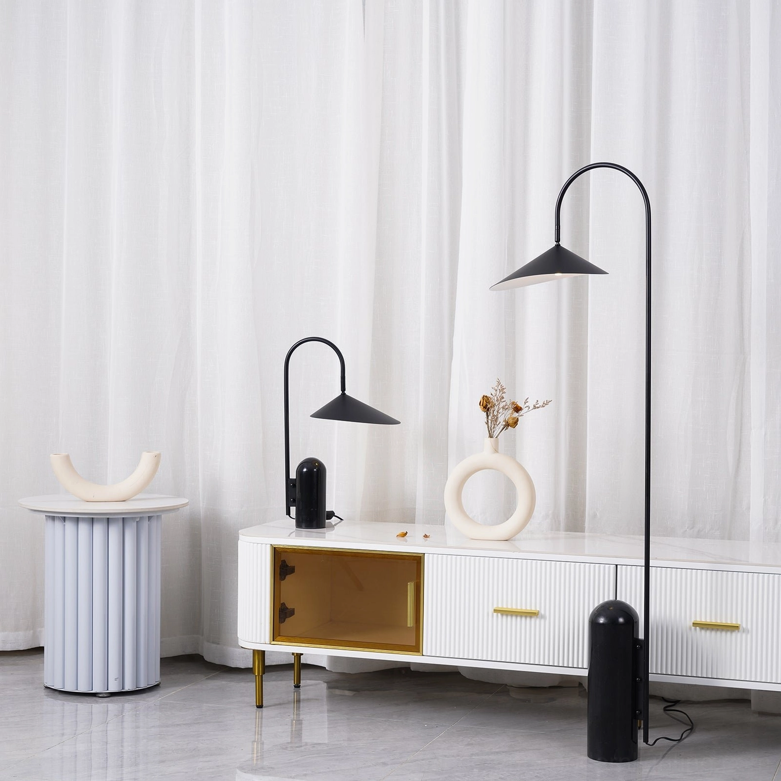Mono floor lamp black finish architectural form in minimalist gallery-like space
