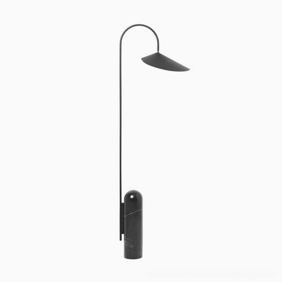 Mono floor lamp black variant studio shot showing sculptural metal and stone materials