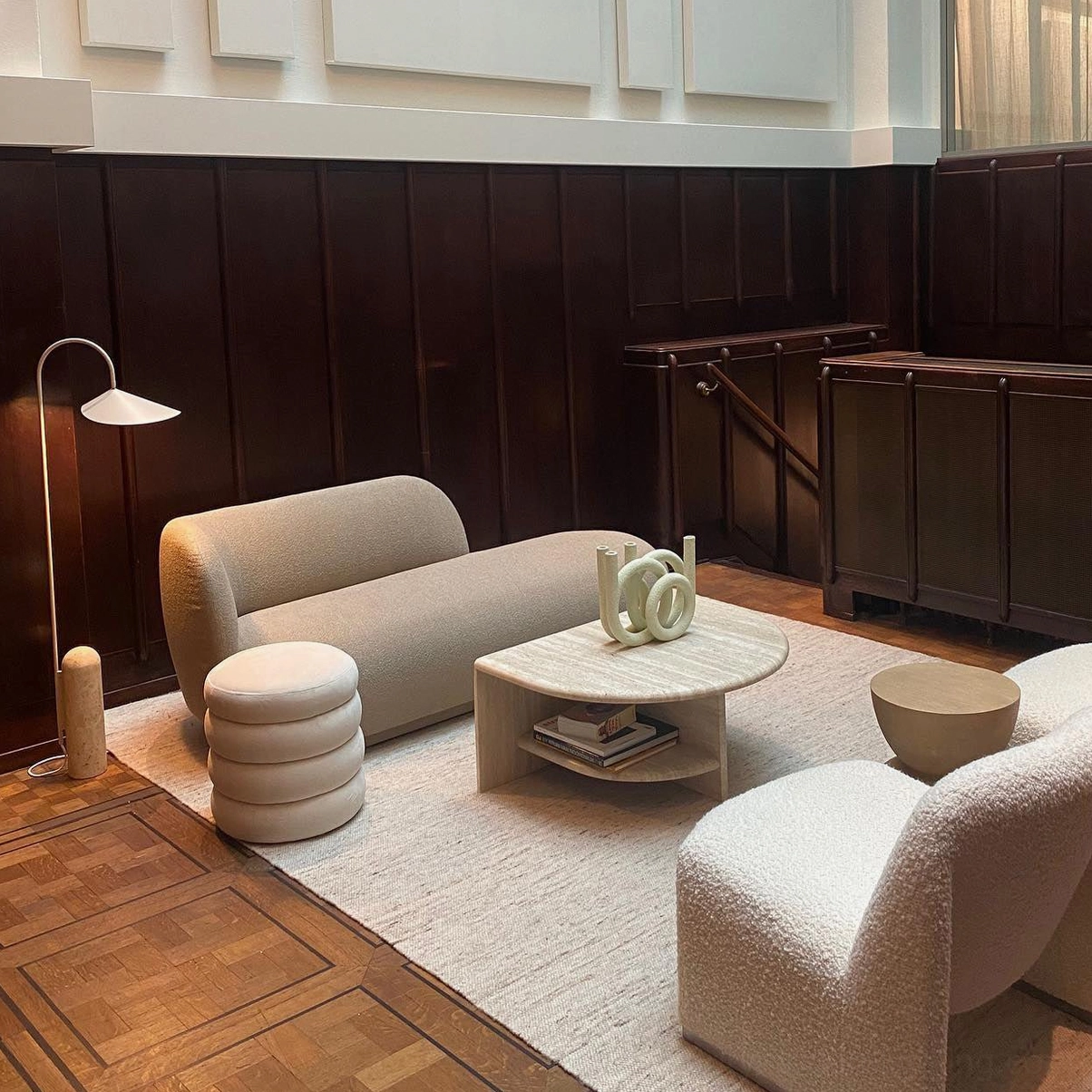 Mono floor lamp in architectural interior space with clean lines and neutral palette