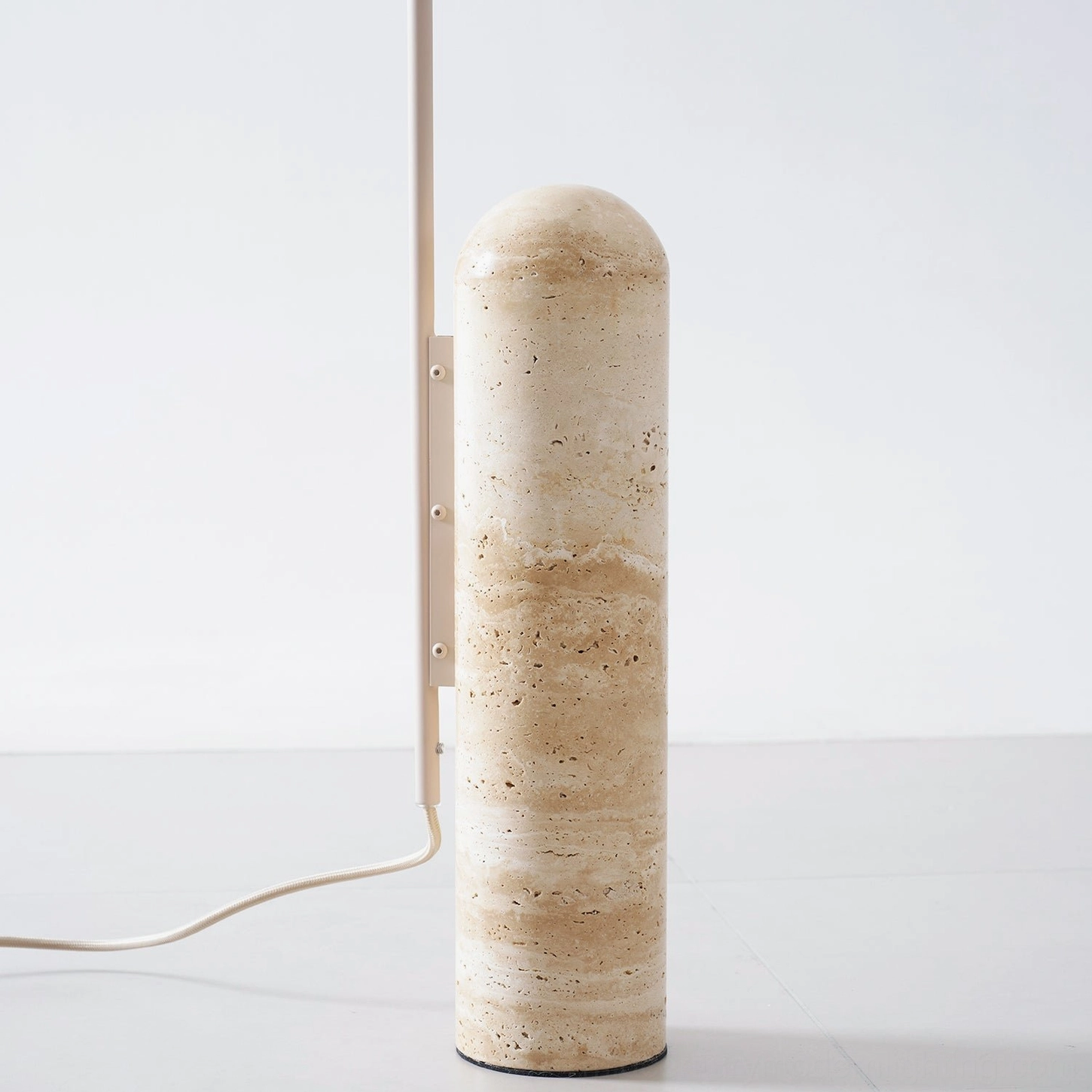 Mono floor lamp installation view showing placement flexibility and cord configuration