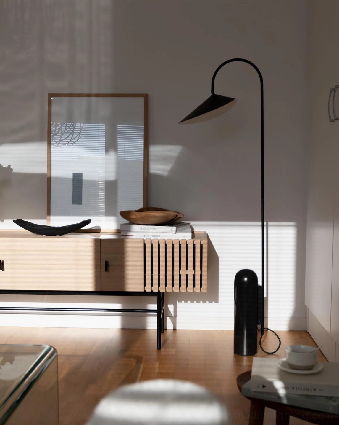 Mono floor lamp in styled Nordic interior with organic materials and warm tones