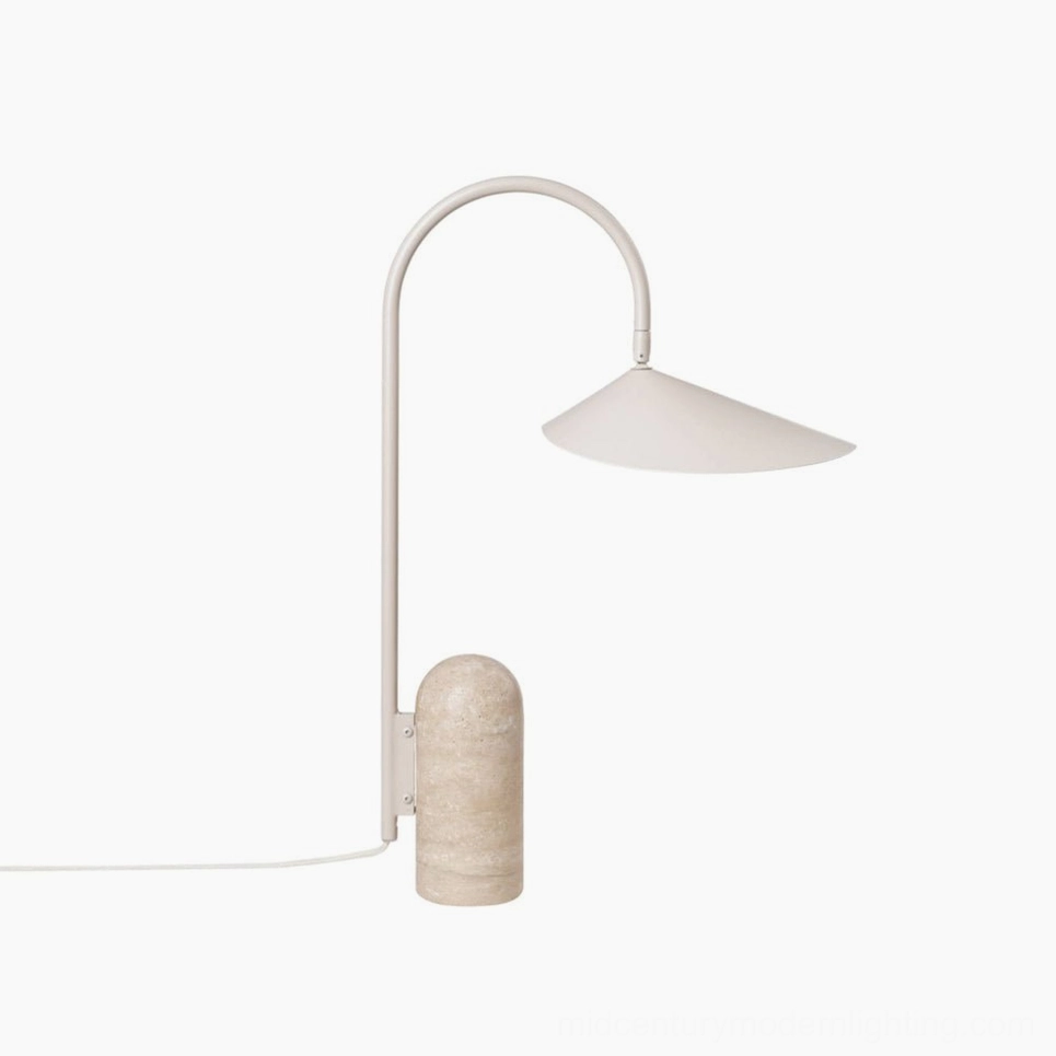 Black arc lamp with sculptural design and natural marble base in contemporary home decor