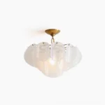 Montecito Glass Ceiling Mount front view studio shot showcasing layered scalloped glass petals with brass gold hardware and clear art glass