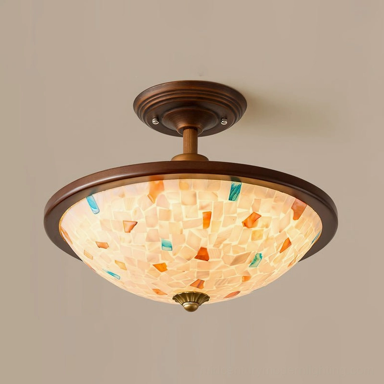 Monterey Capiz ceiling light with illuminated warm shell mosaic shade and vintage brown frame on white background