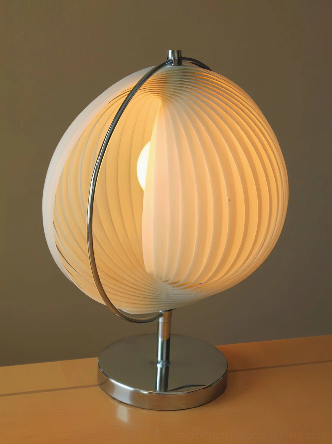 Moon Kare pleated globe table lamp side profile showing interior Edison bulb, partially open shade design