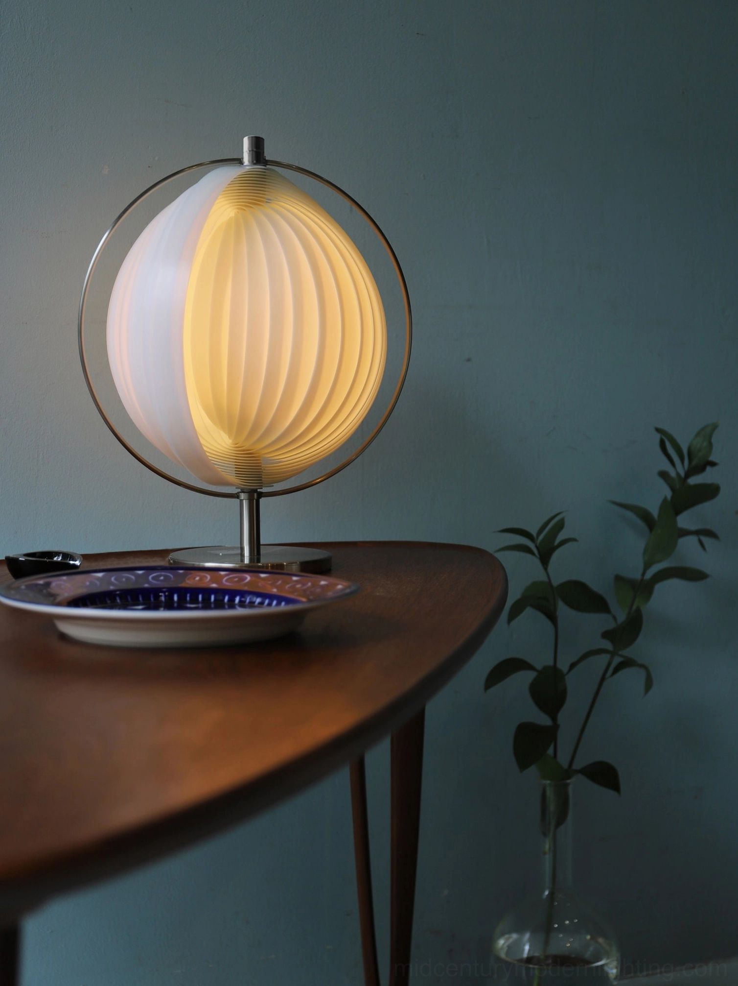 Moon Kare globe table lamp with white ribbed shade and polished chrome base, minimalist design aesthetic