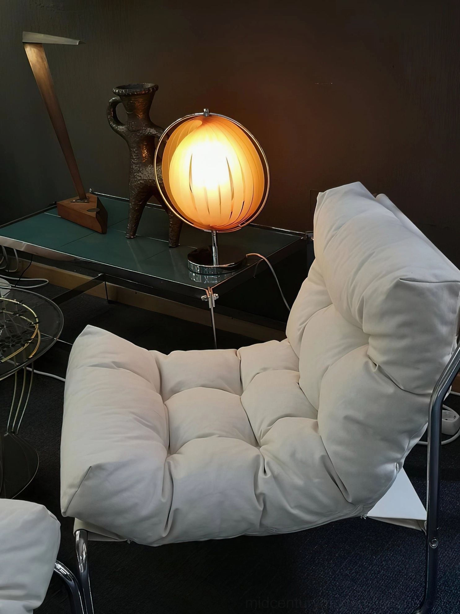 Moon Kare pleated globe table lamp articulated design showing rotatable shade mechanism and light diffusion