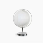 Moon Kare rotatable globe table lamp with chrome base and white pleated ribbed shade, front view studio display