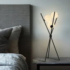 Modern minimalist Moon lamp positioned on bedroom nightstand with warm ambient glow